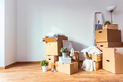 Cardboard-boxes-and-cleaning-things-for-moving-into-a-new-home